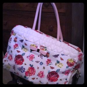 Betsy Johnson duffel bag.